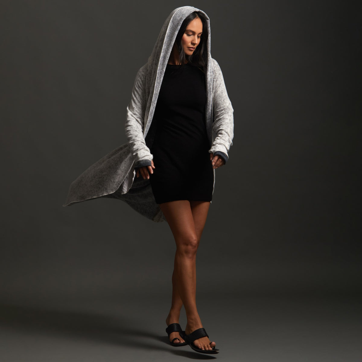 Woman modeling mineral grey aion duster