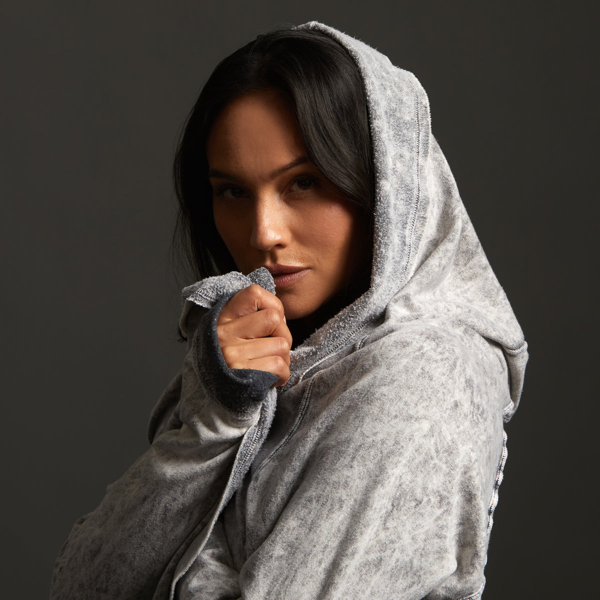 Woman modeling mineral grey aion duster