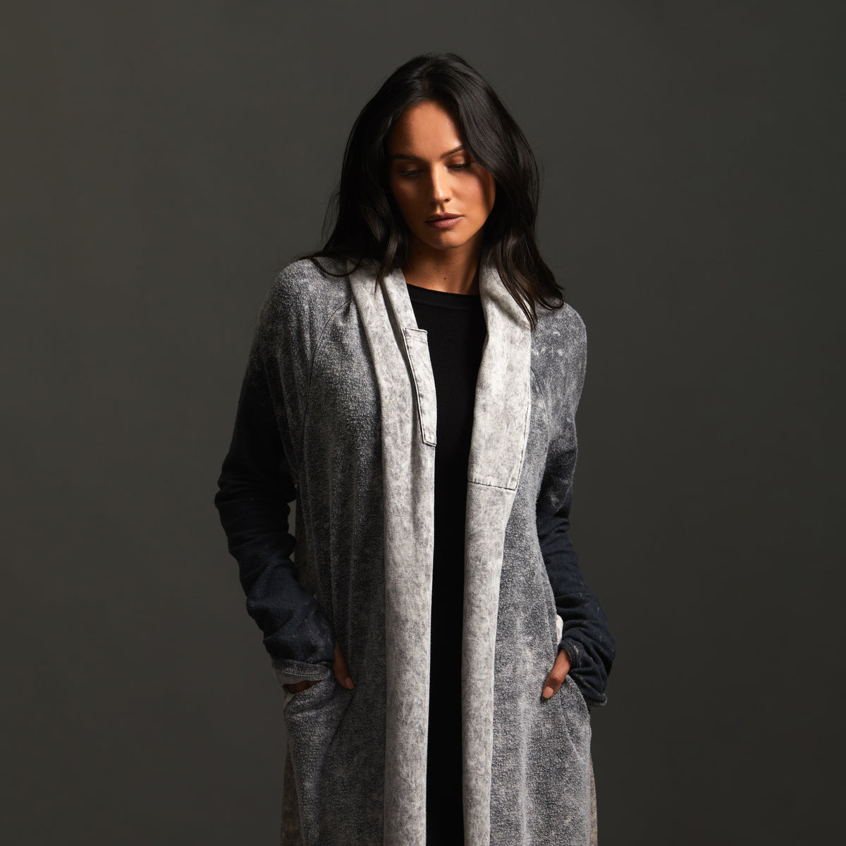 Woman modeling mineral grey aion duster