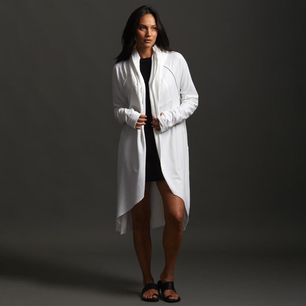 Woman modeling white aion duster