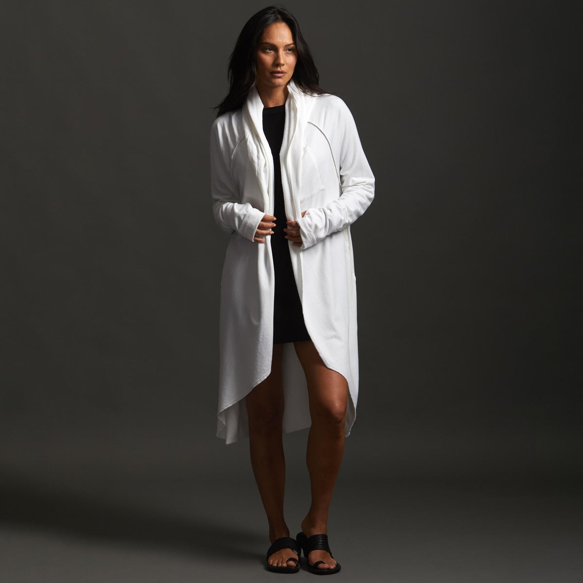 Woman modeling white aion duster