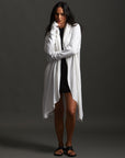Woman modeling white aion duster