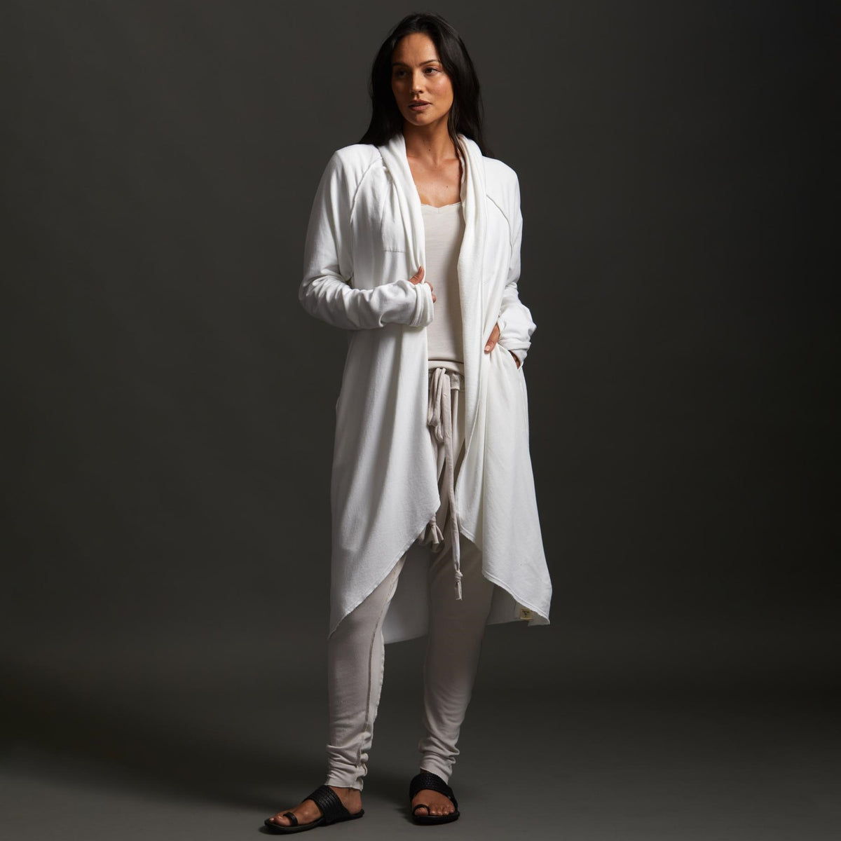 Woman modeling white aion duster