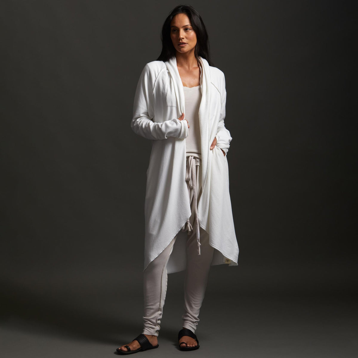 Woman modeling white aion duster