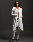 Woman modeling white aion duster