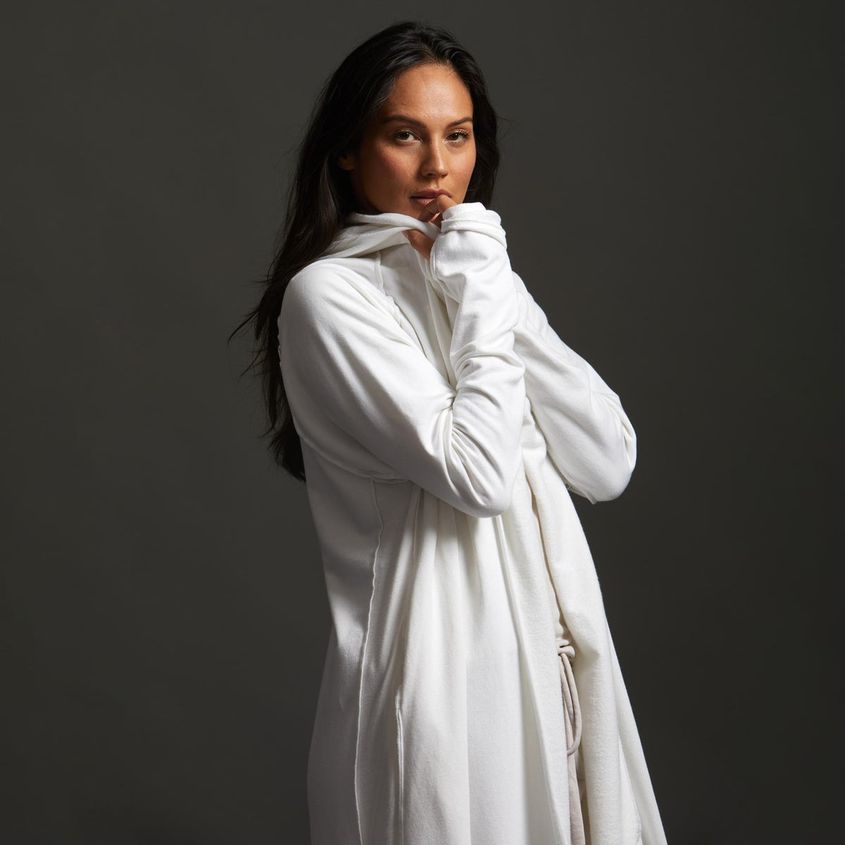 Woman modeling white aion duster