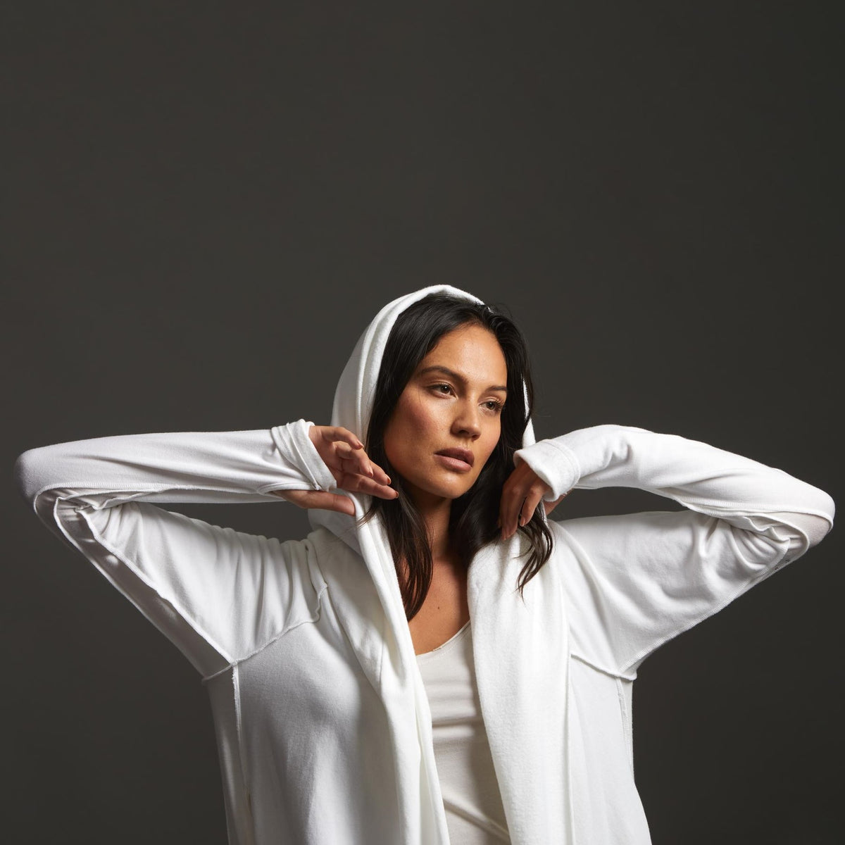 Woman modeling white aion duster