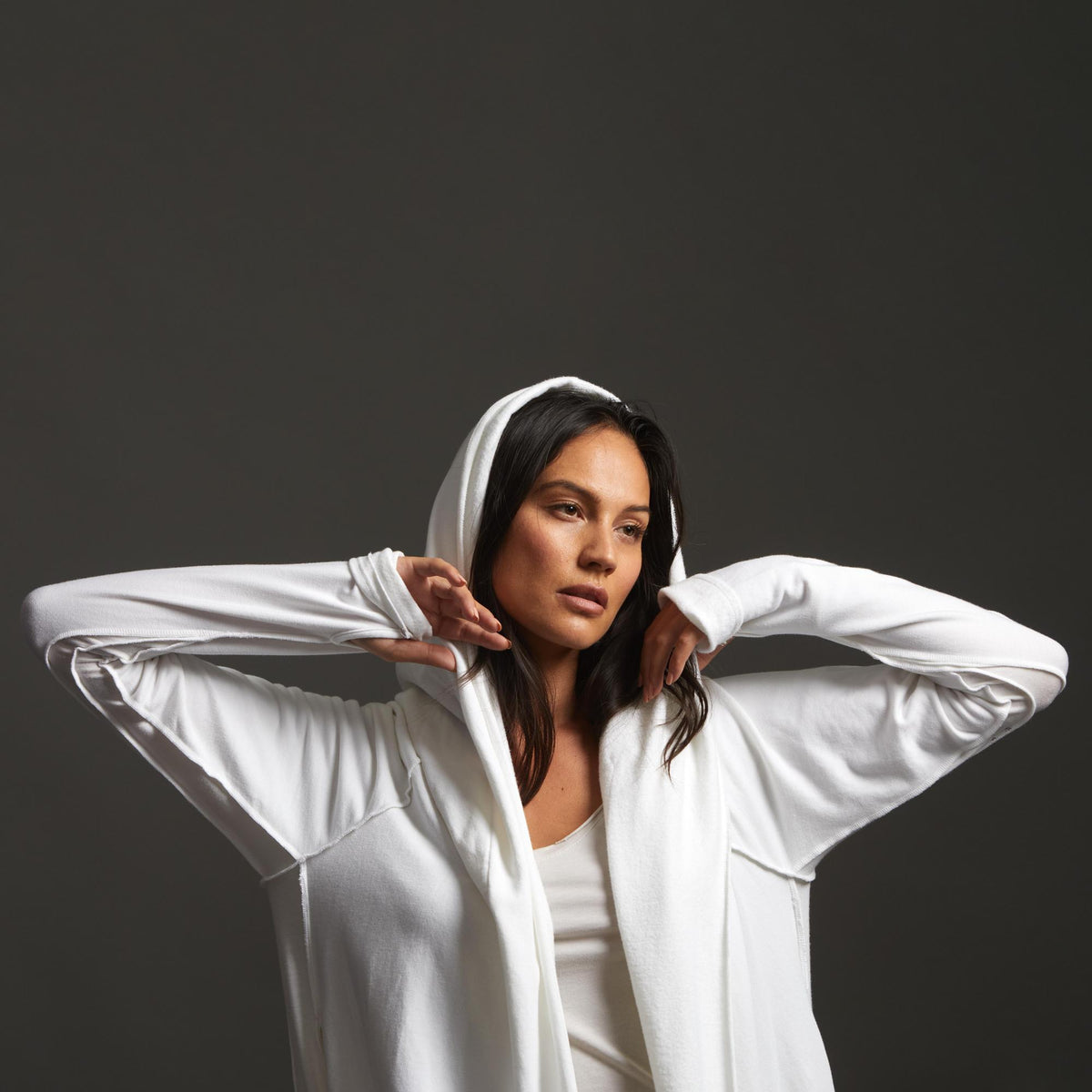 Woman modeling white aion duster