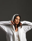 Woman modeling white aion duster