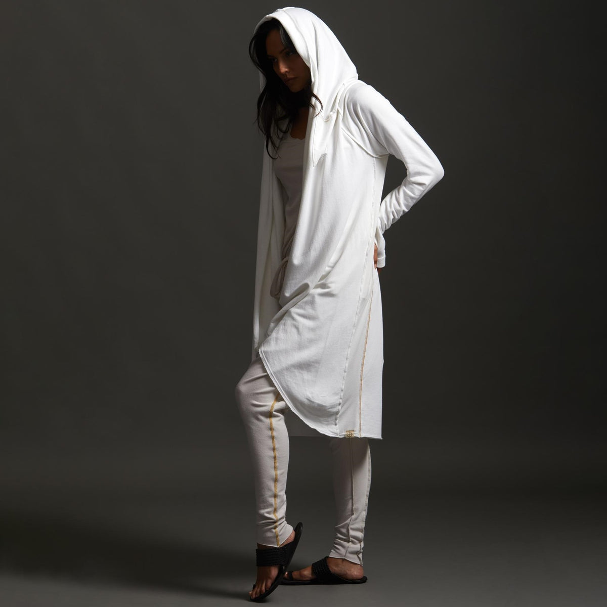 Woman modeling white aion duster