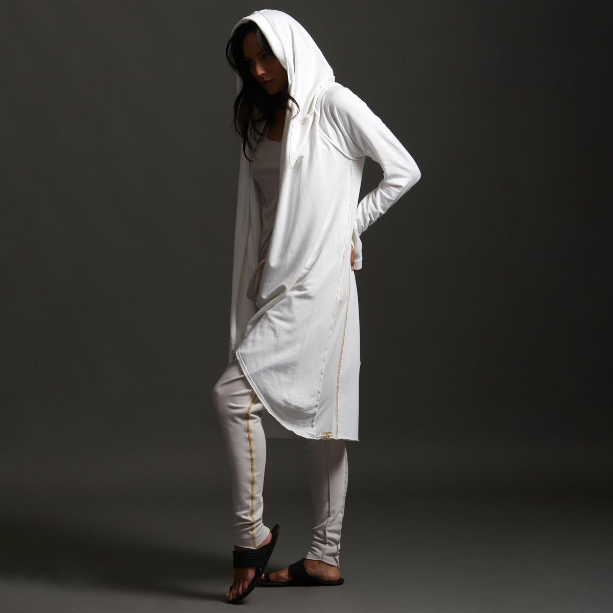 Woman modeling white aion duster