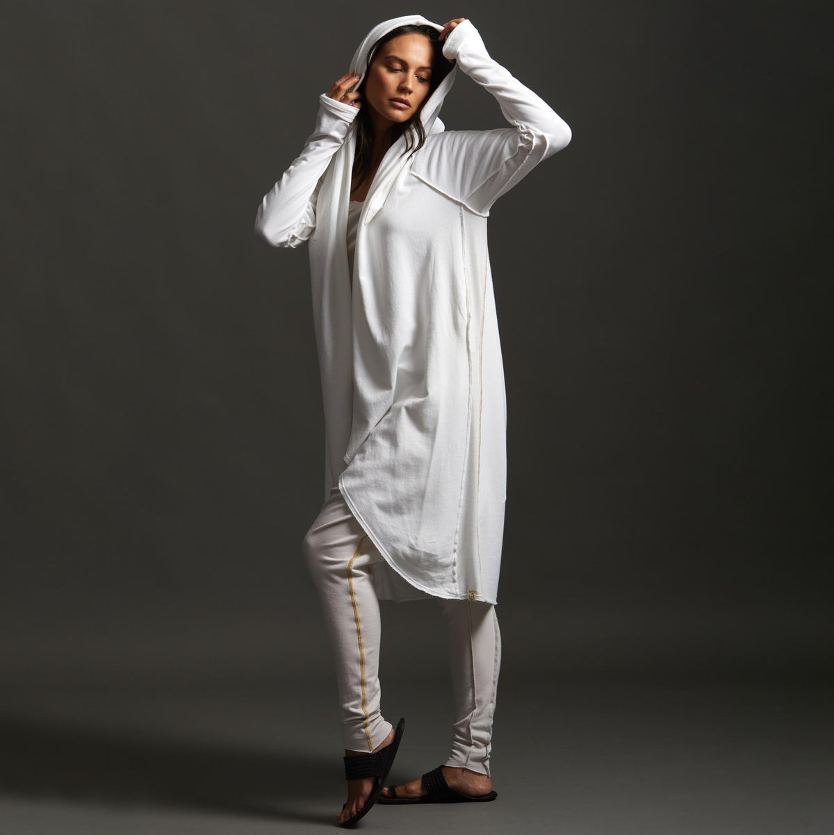 Woman modeling white aion duster