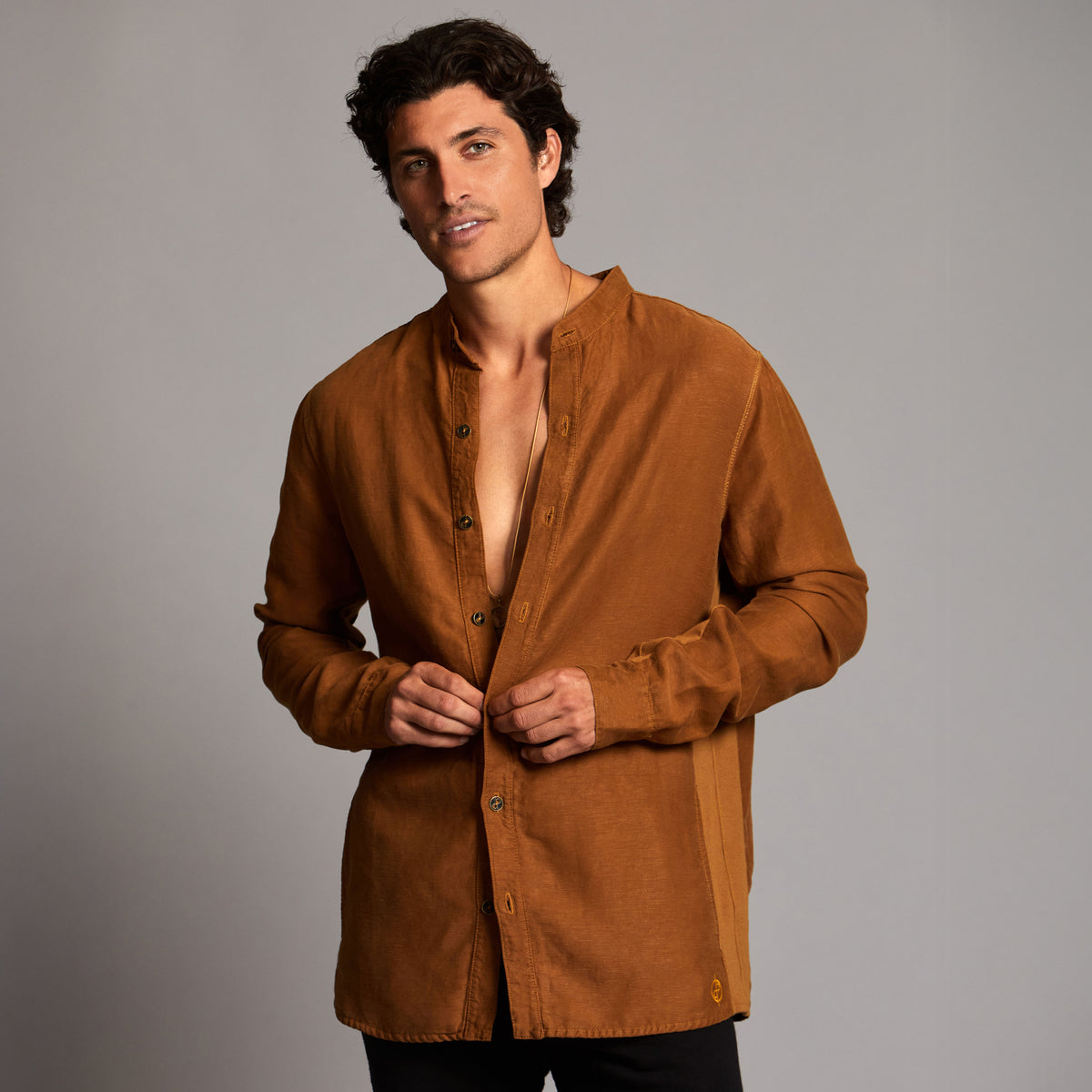 Male modeling Shacket in Whiskey Haze