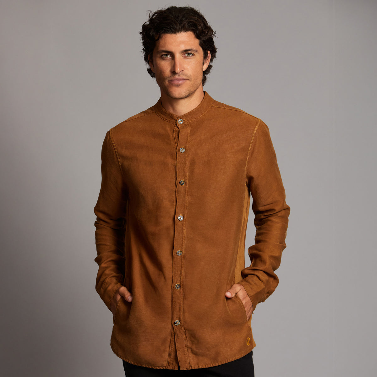 Male modeling Shacket in Whiskey Haze