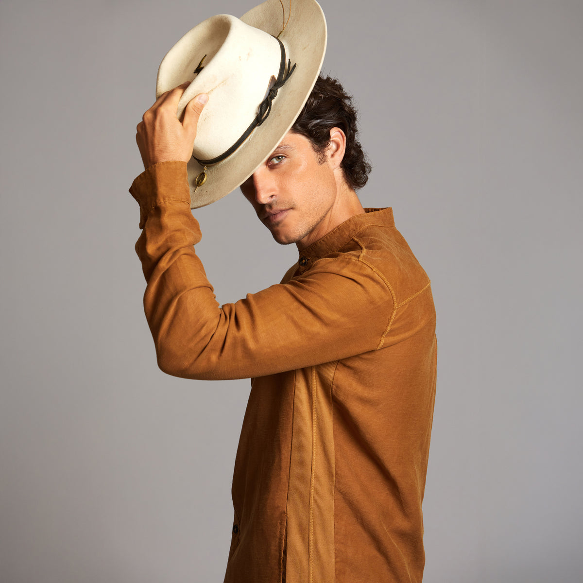 Male modeling Shacket in Whiskey Haze