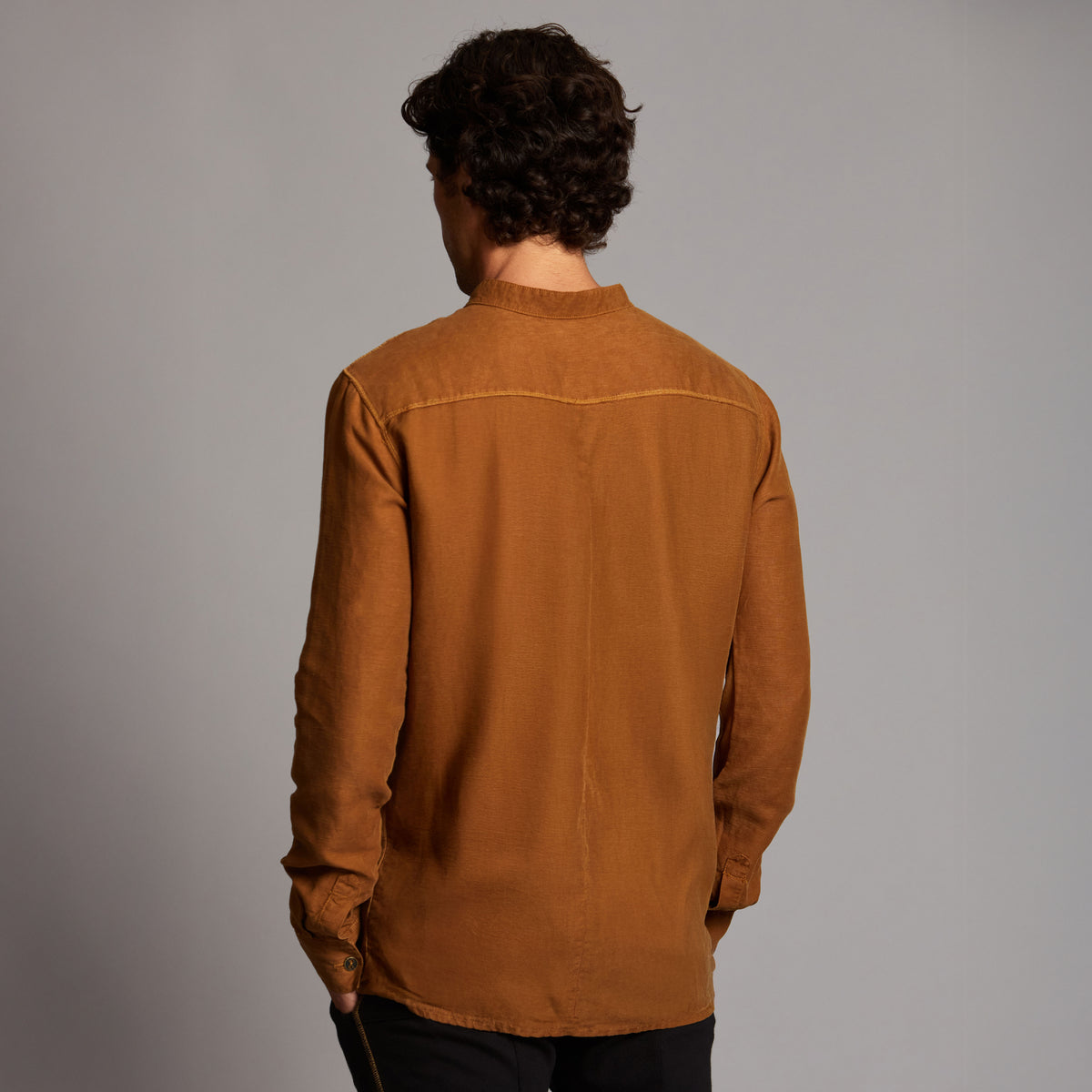 Male modeling Shacket in Whiskey Haze