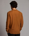 Male modeling Shacket in Whiskey Haze