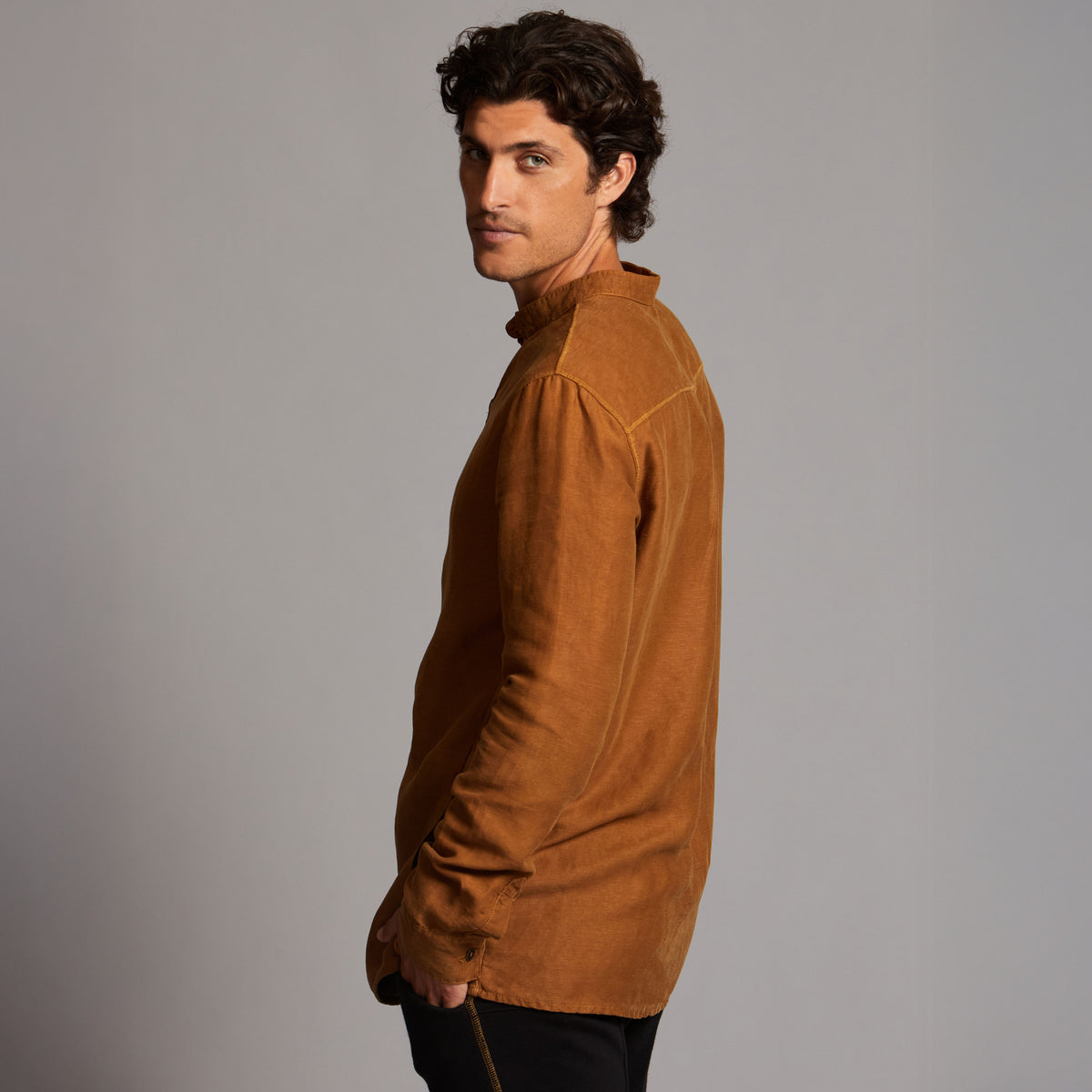 Male modeling Shacket in Whiskey Haze