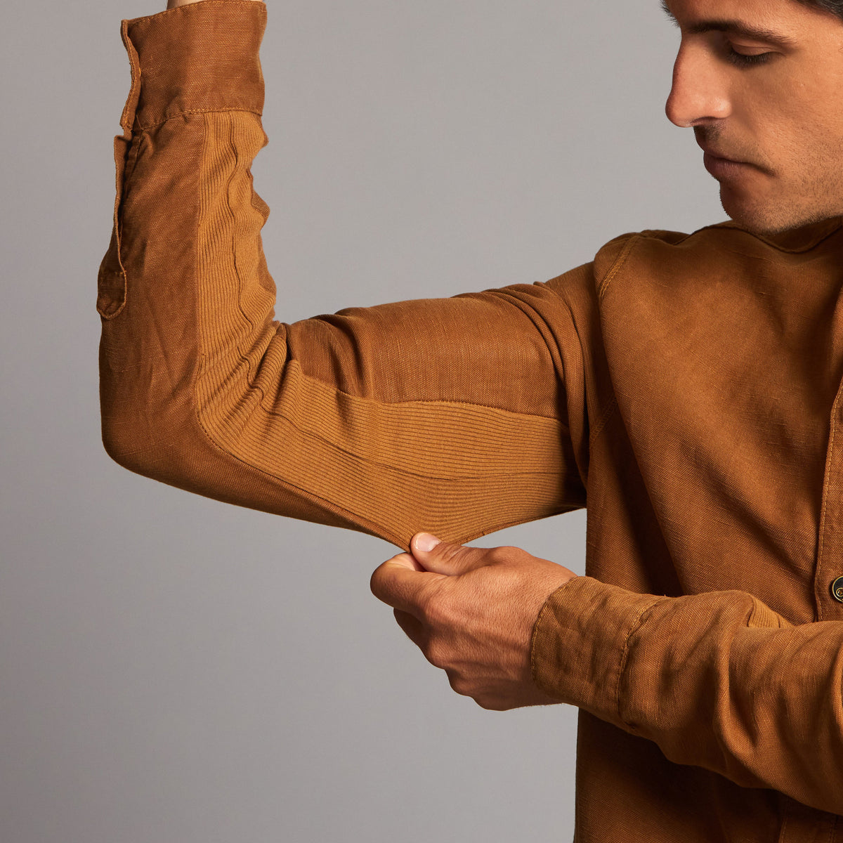 Male modeling Shacket in Whiskey Haze