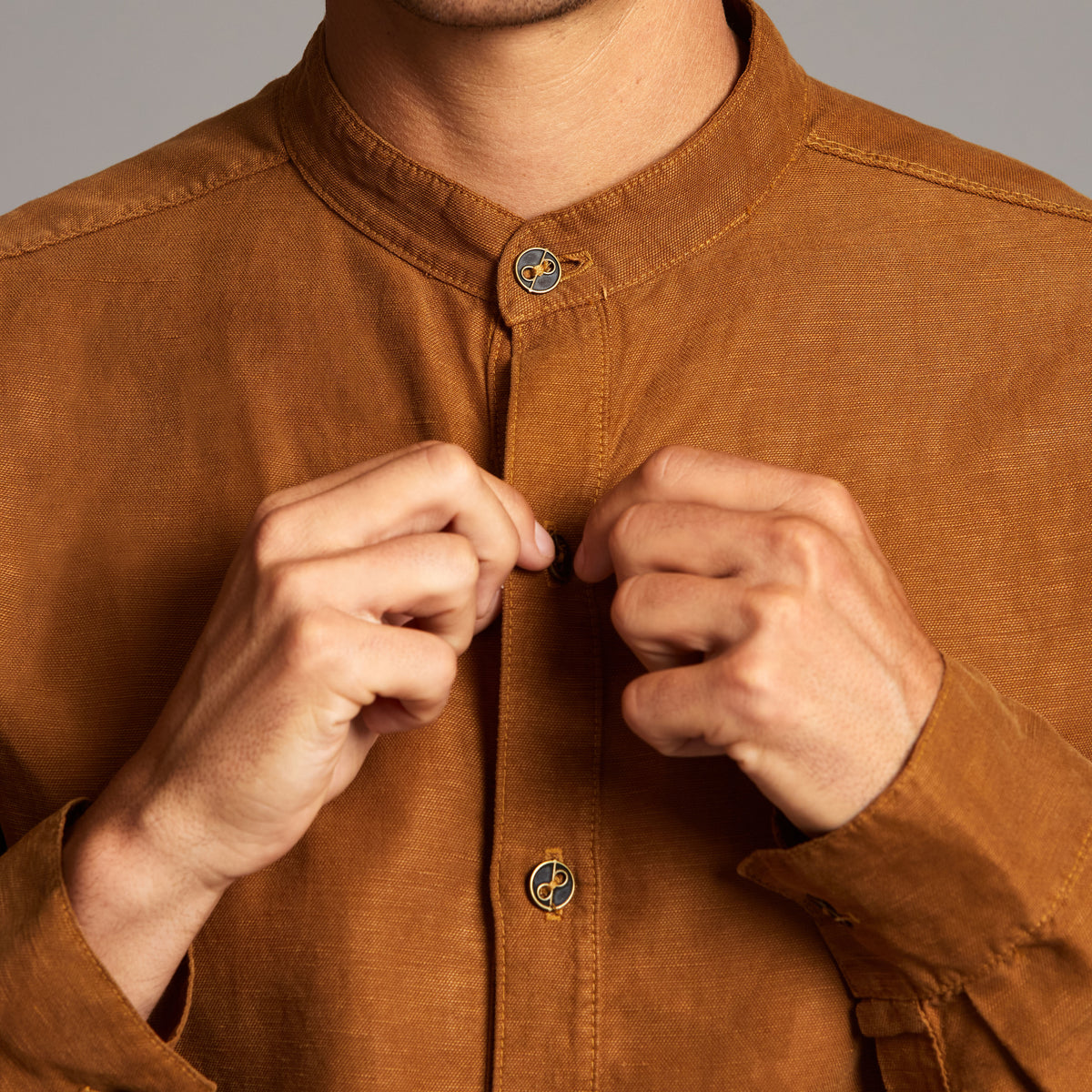 Male modeling Shacket in Whiskey Haze