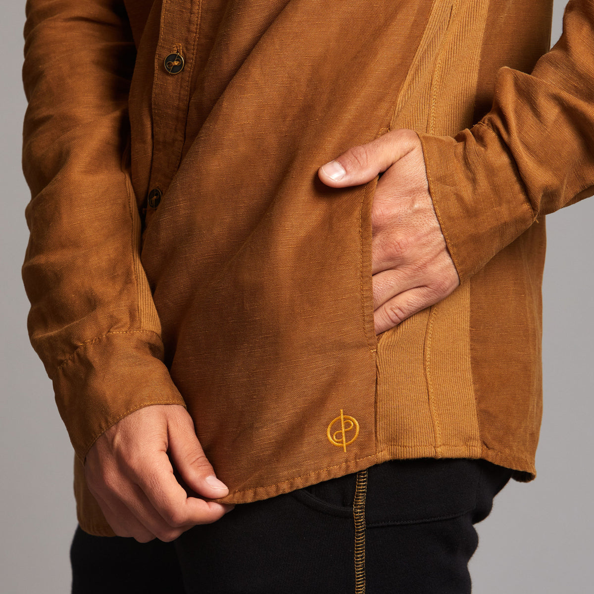 Male modeling Shacket in Whiskey Haze