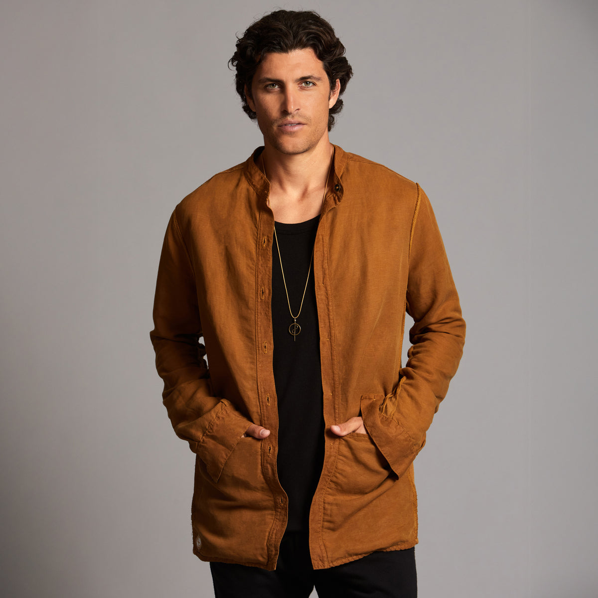 Male modeling Shacket in Whiskey Haze