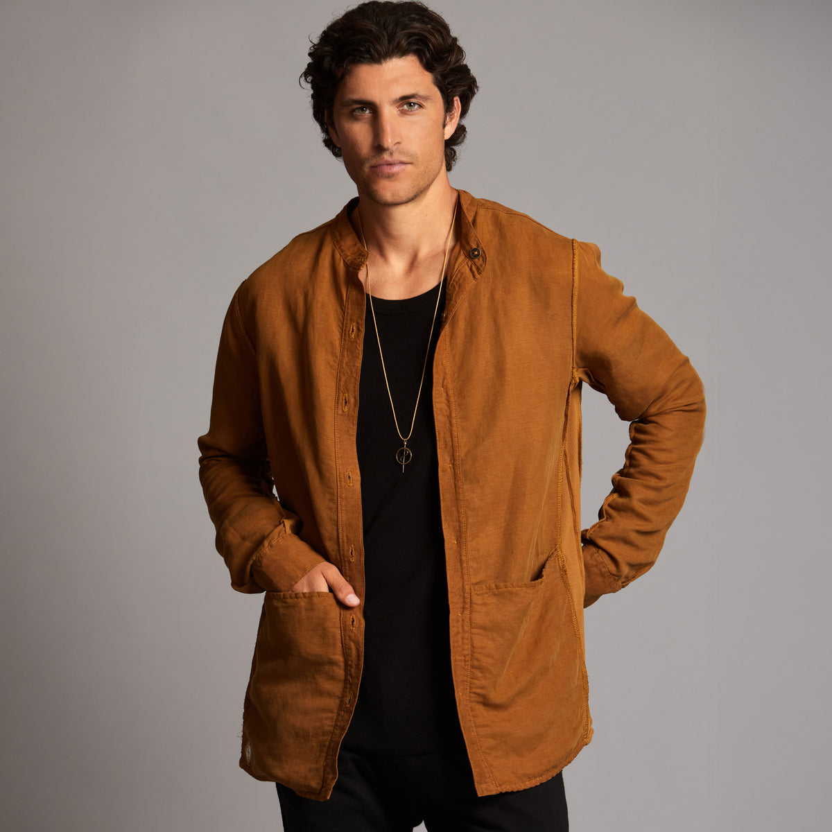 Male modeling Shacket in Whiskey Haze