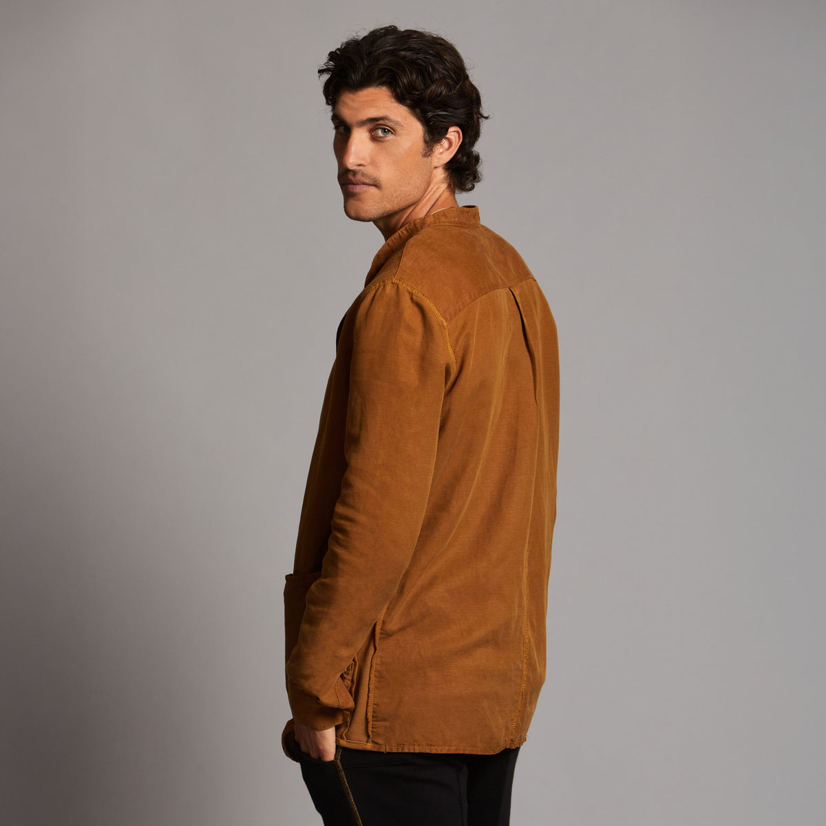 Male modeling Shacket in Whiskey Haze