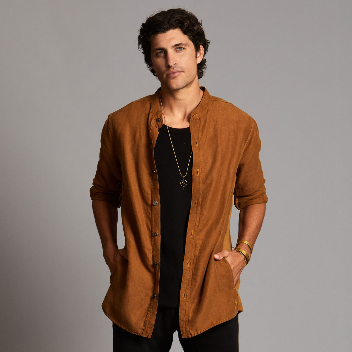 Male modeling Shacket in Whiskey Haze
