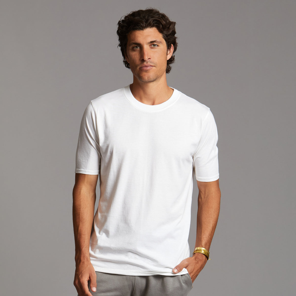 Man modeling Elemental shirt in white