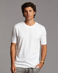 Man modeling Elemental shirt in white
