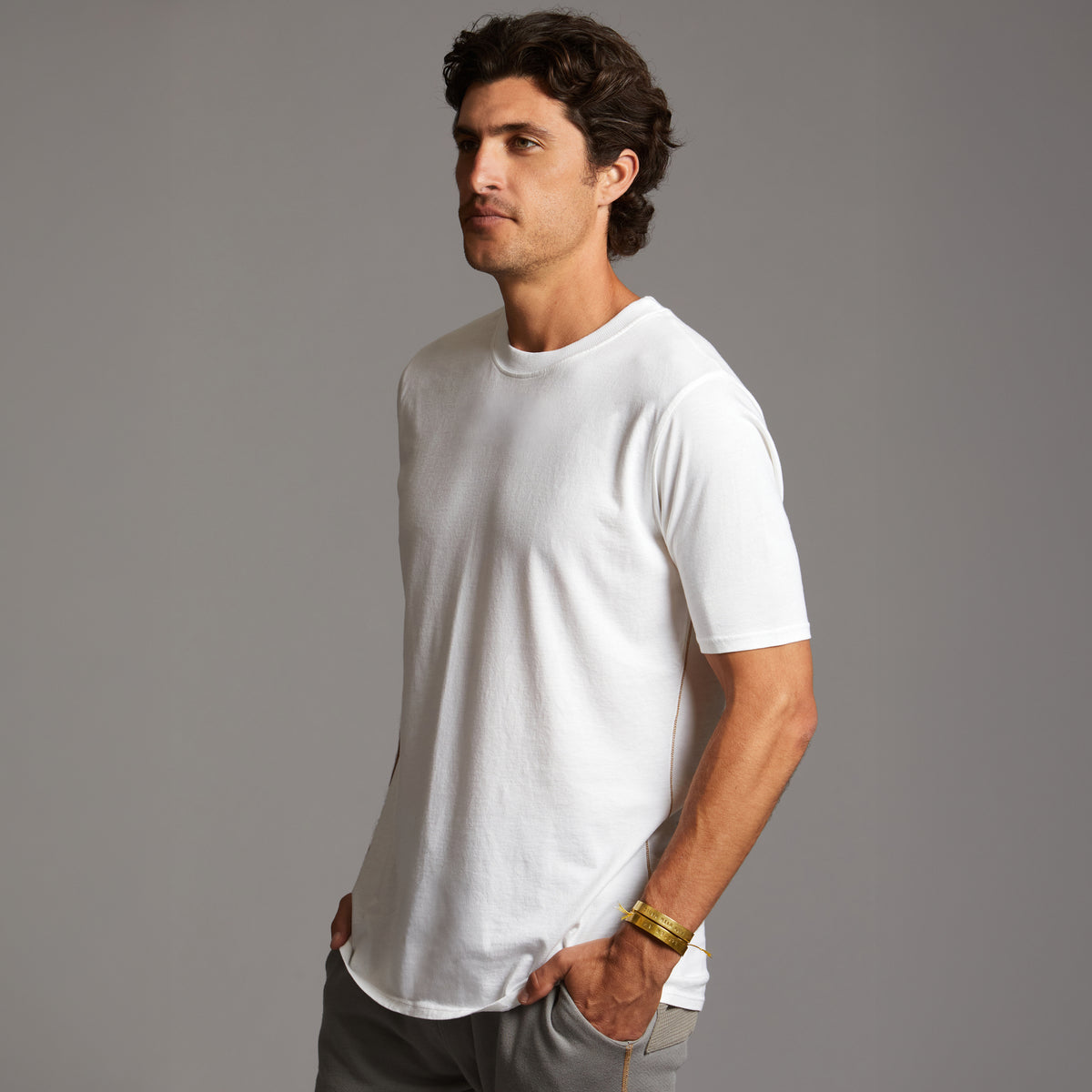 Man modeling Elemental shirt in white