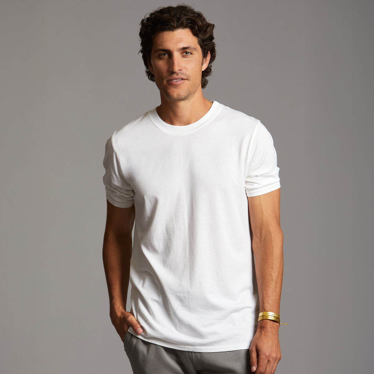 Man modeling Elemental shirt in white