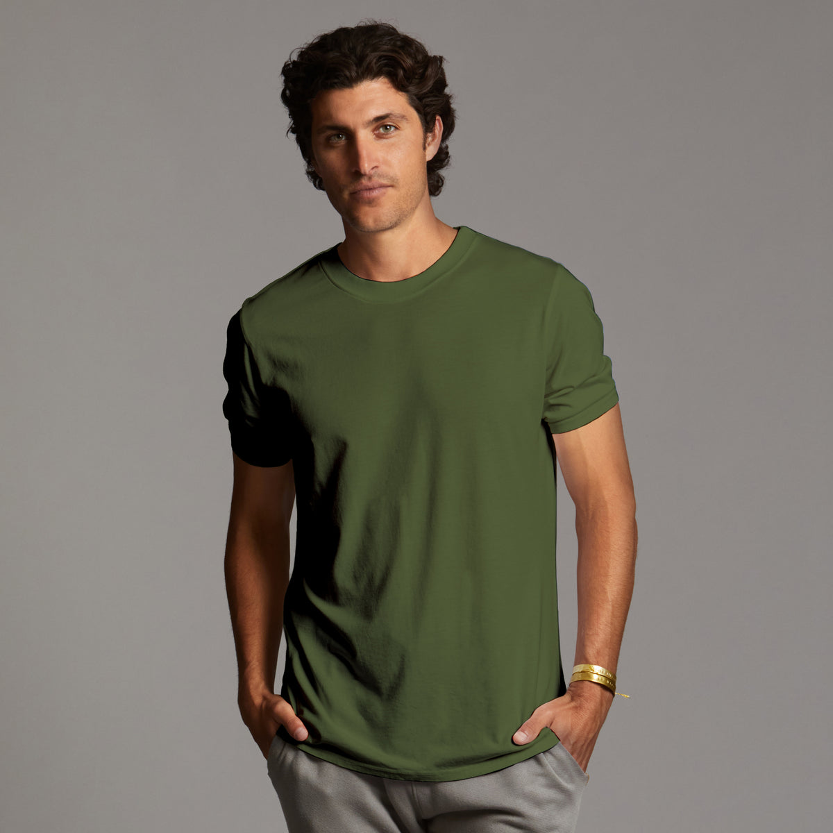 Male modeling green bean elemental tee