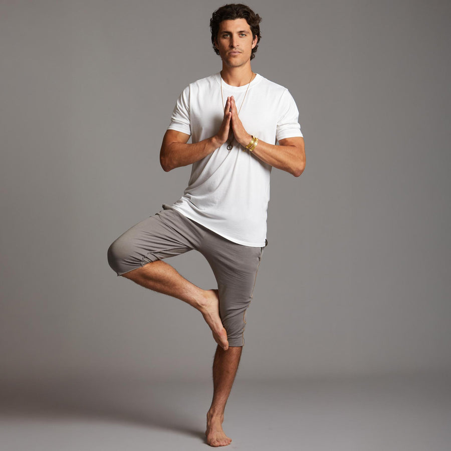 Male modeling Brazen colored yogo mid shorts