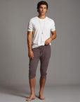 Male modeling Brazen colored yogo mid pants