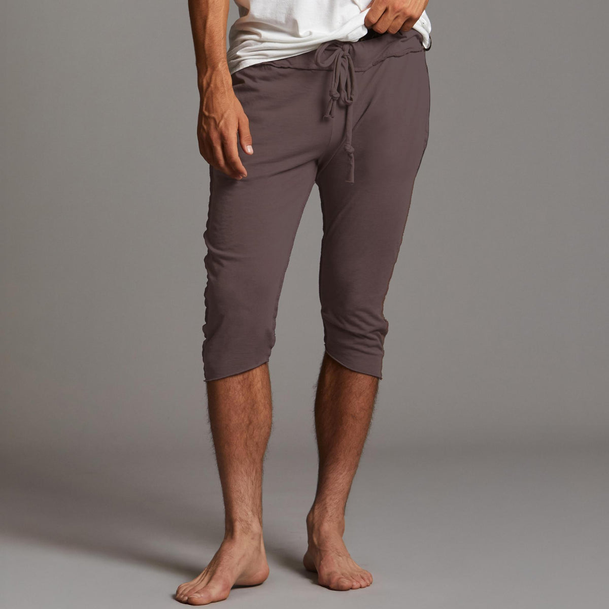 Male modeling Brazen colored yogo mid pants
