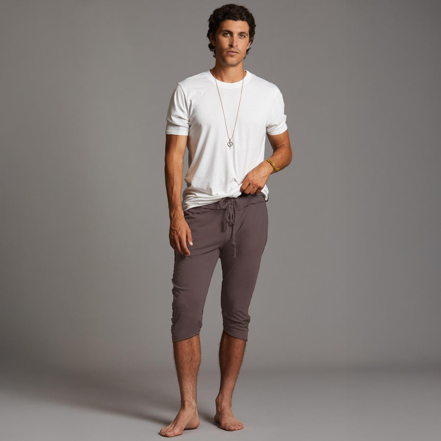 Male modeling Brazen colored yogo mid pants