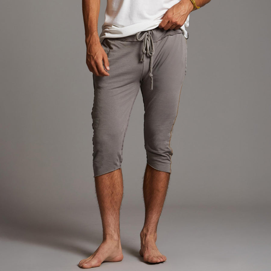 Male modeling Brazen colored yogo mid shorts