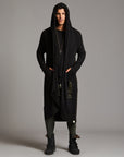 Man modeling a duster with gold graphics