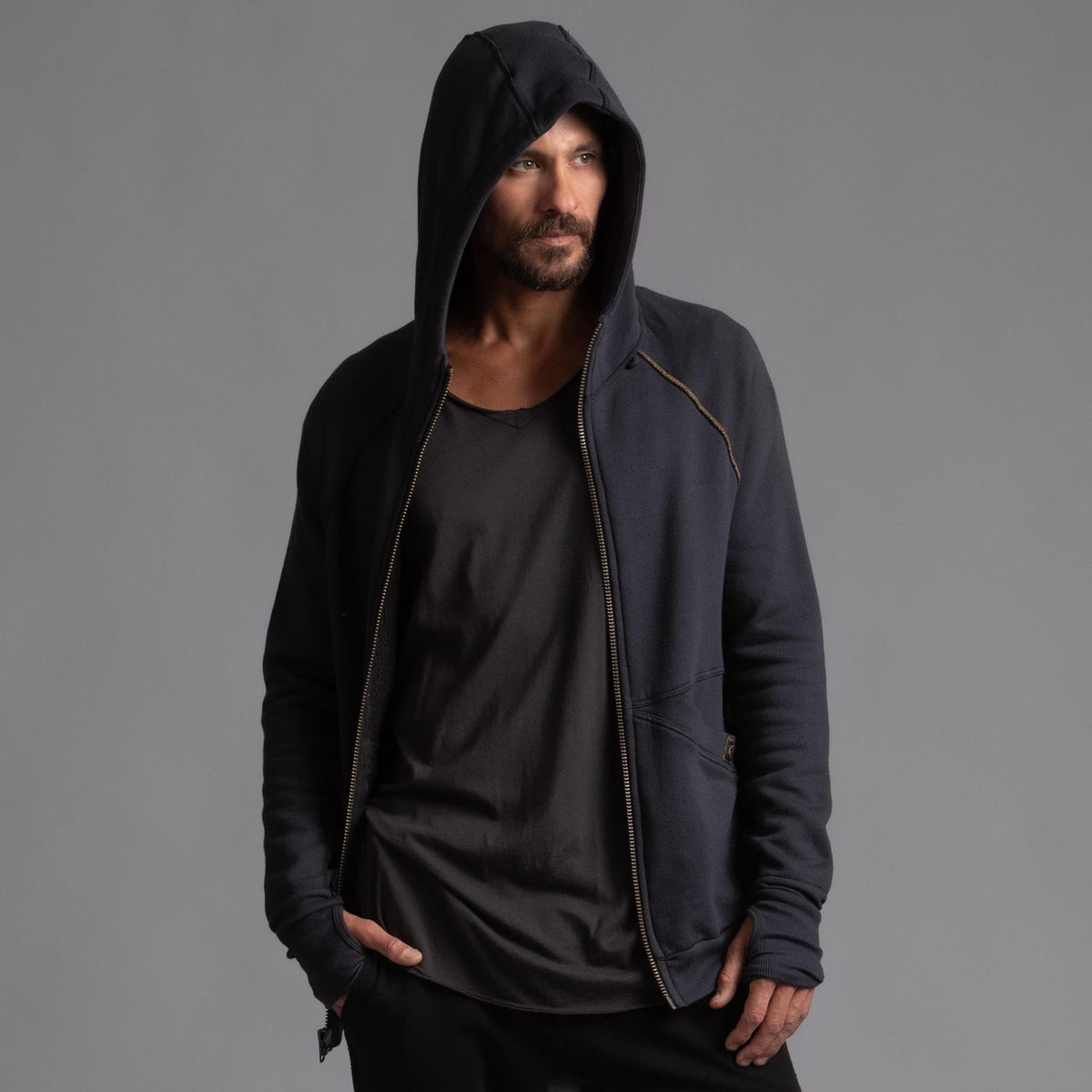 Male modeling dark blue zip tree hoodie