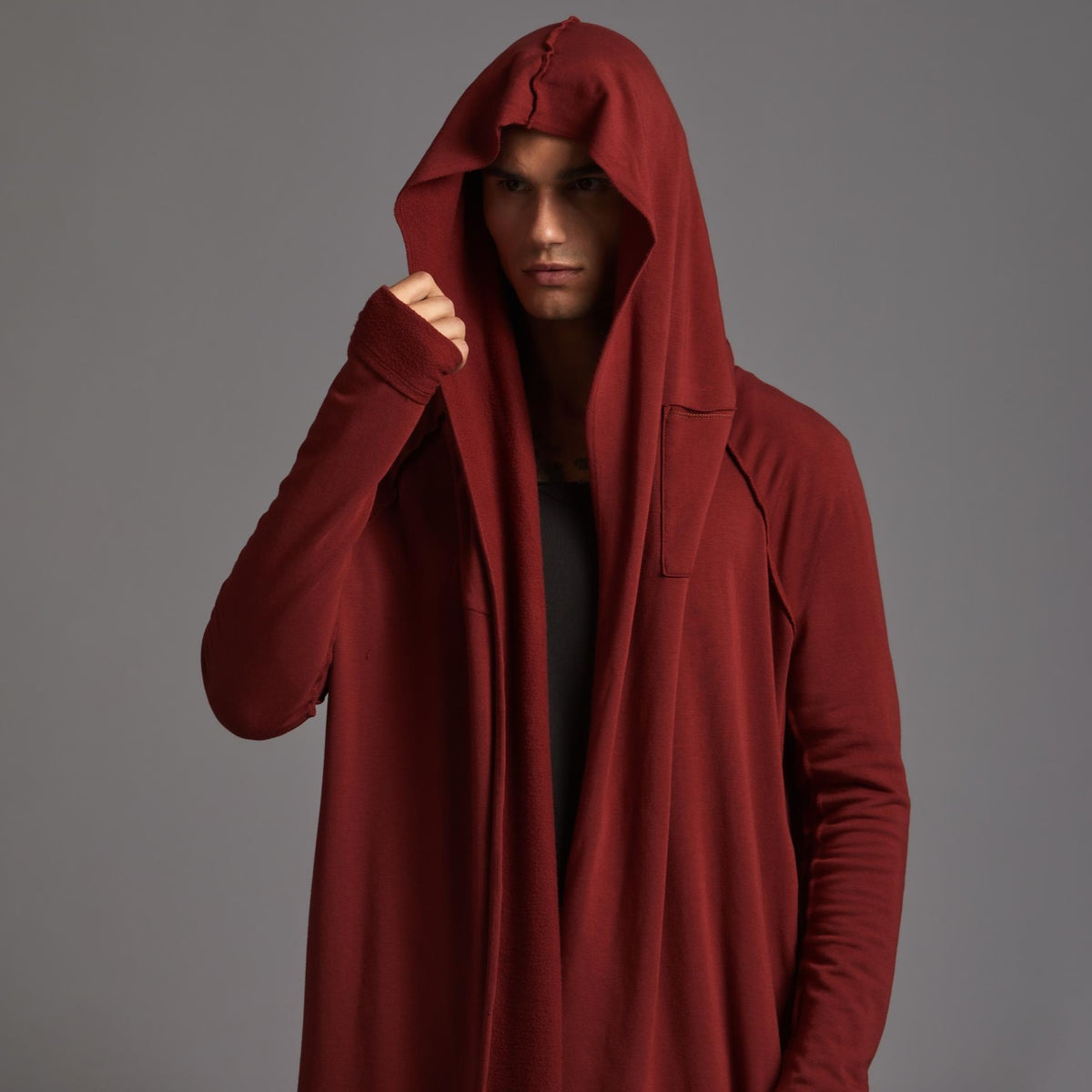 Male modeling red kairos duster