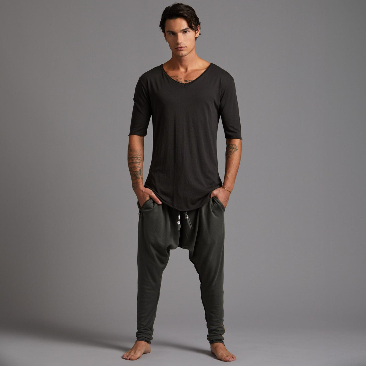Male modeling Urban Forest green colored pants