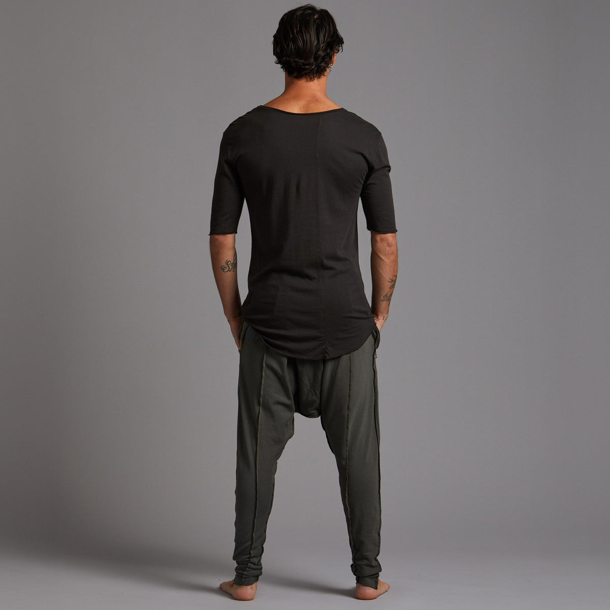Male modeling Urban Forest green colored pants