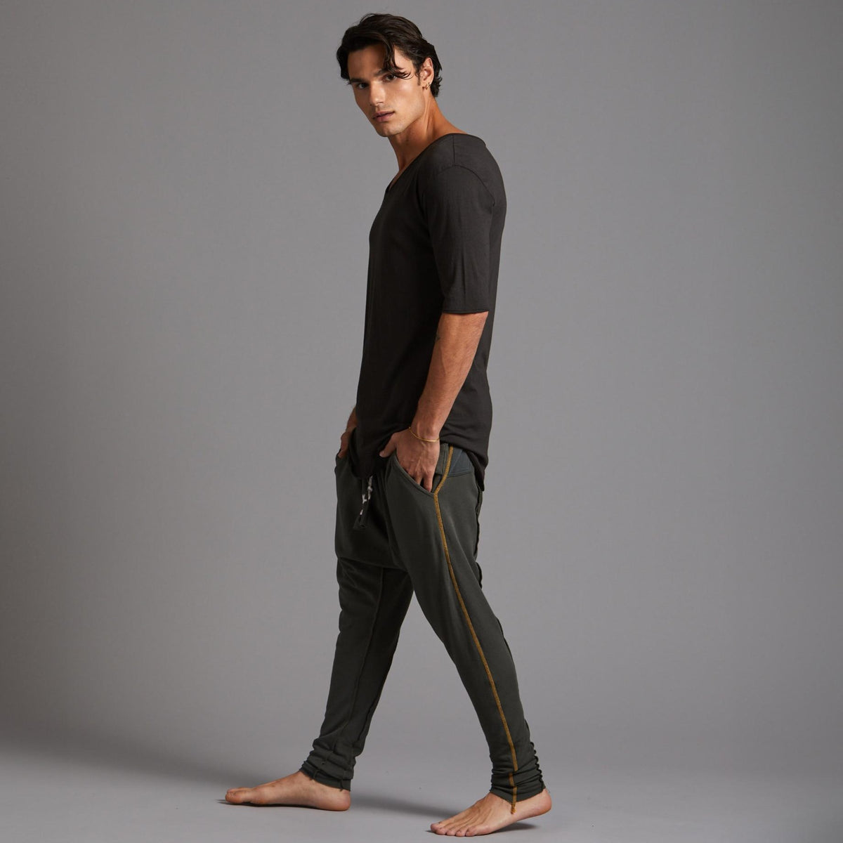 Male modeling Urban Forest green colored pants