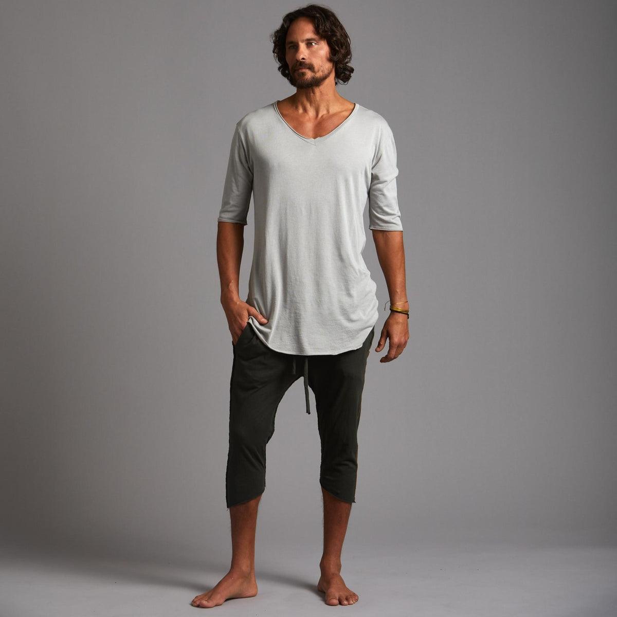 Male modeling Urban Forest green yogo mid shorts