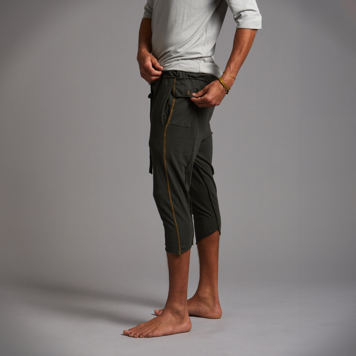 Male modeling Urban Forest green yogo mid shorts