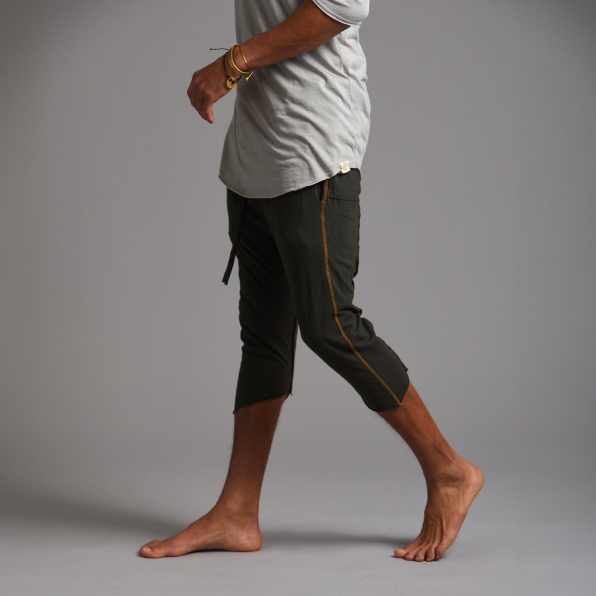 Male modeling Urban Forest green yogo mid shorts