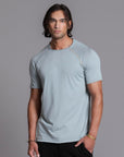 Male modeling agave teal ultimate tee shirt