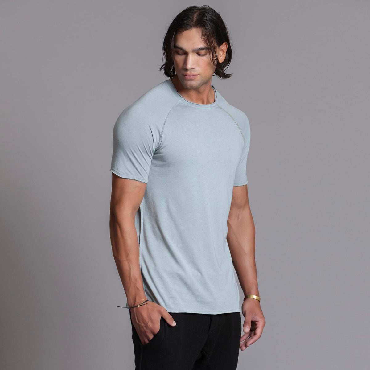 Male modeling agave teal ultimate tee shirt